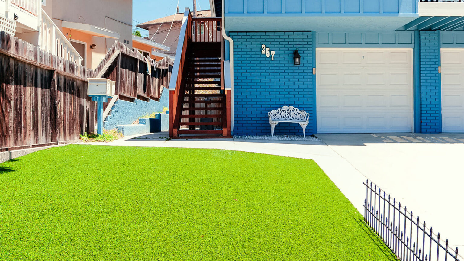 A photo of Artificial Turf installation in New Orleans by Miller Outdoors for the blog, "How Much Does Artificial Turf Cost?".
