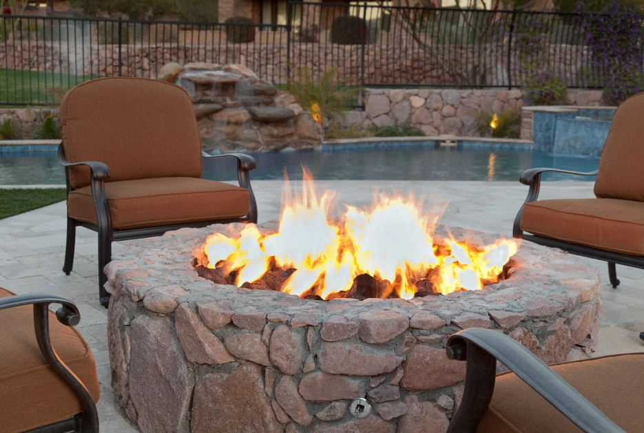 outdoor living spaces with fireplace.